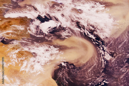 Fototapeta Naklejka Na Ścianę i Meble -  Sandstorm from space. Elements of this image furnished by NASA