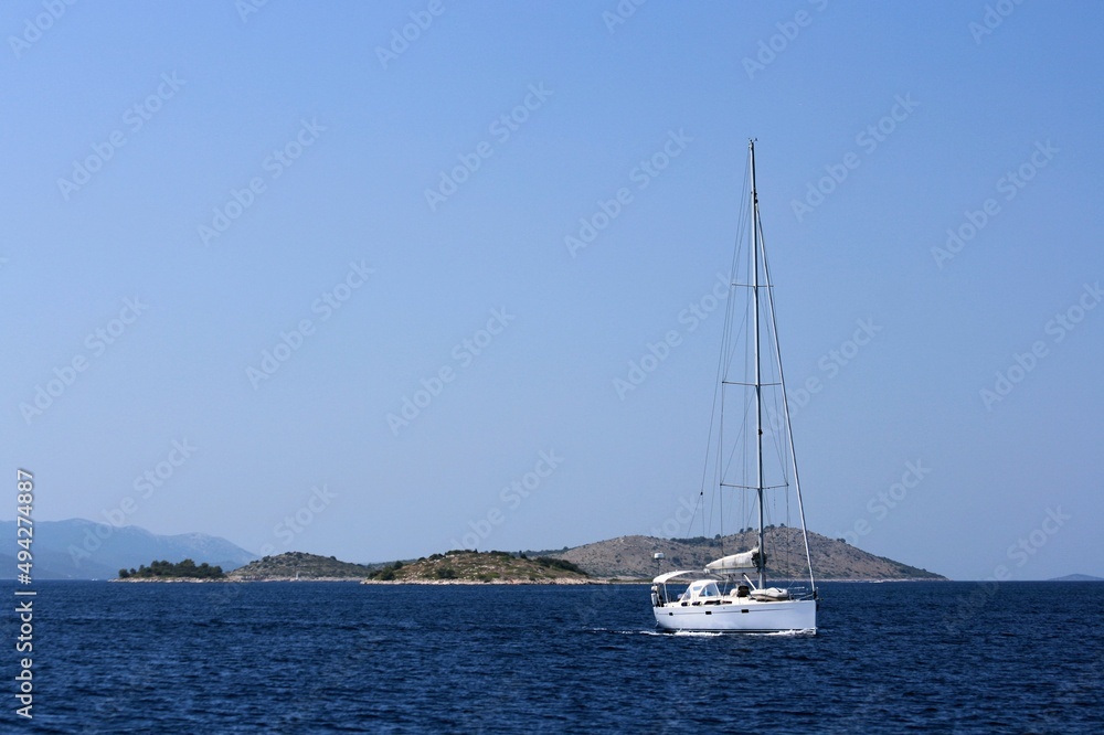 sailing boat in front of the lovely islands in national park Kornati, Croatia sailing boat in front of the lovely islands in national park Kornati, Croatia
