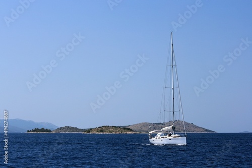 sailing boat in front of the lovely islands in national park Kornati, Croatia