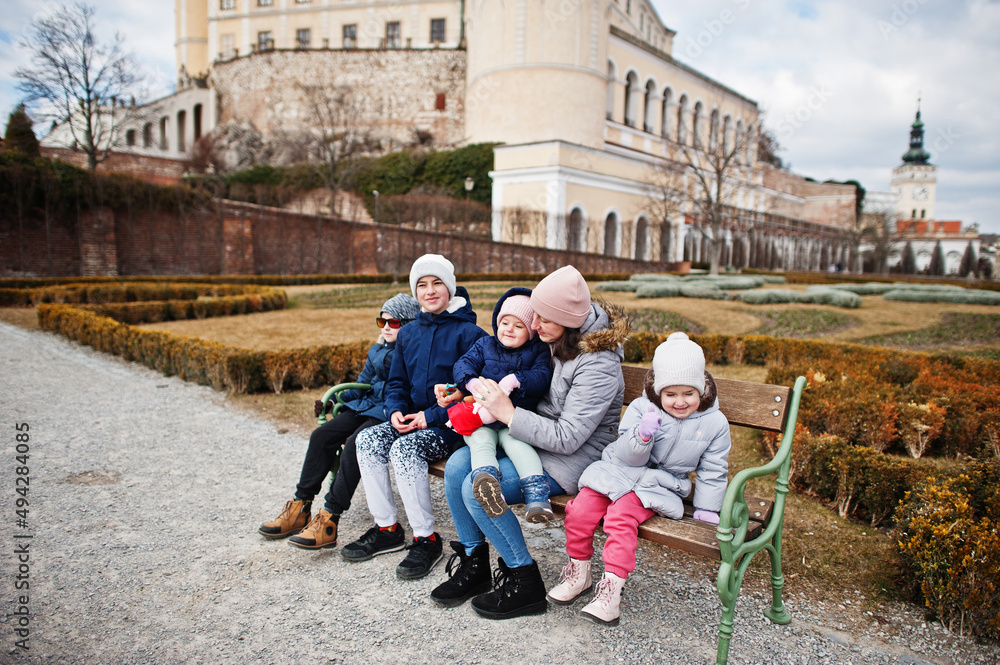 Obraz premium Family walking at historical Mikulov Castle, Moravia, Czech Republic. Old European town.