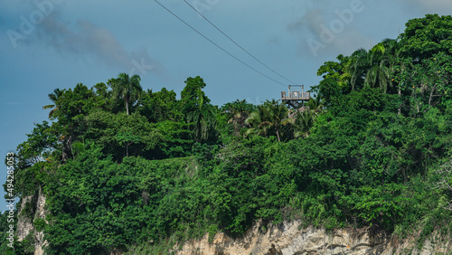 Zipline station on a cliff in the rainforest