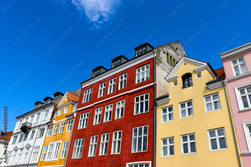 Nyhavn district in Copenhagen, Denmark. City center panoramic view of colorful houses. High quality photo