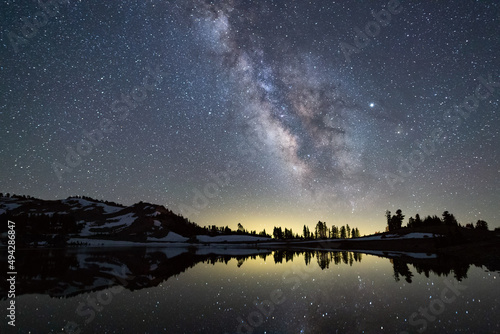 The Milky Way over Emerald Lake in Lassen Volcanic National Park, California photo