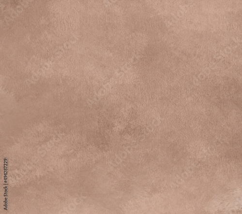 Brown beige background with grunge paper texture or stone wall texture or velvet or velor takani feel	