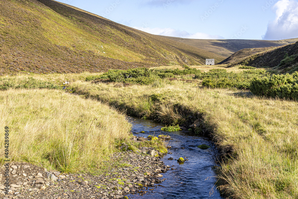 Looking towards the old Lecht Mine in the valley of Conglass Water at Blairnamarrow near Tomintoul, Moray, Scotland UK.