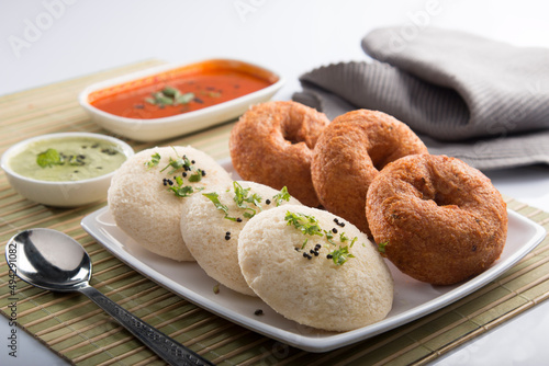 Idli Wada chutney sambhar. South Indian food menu. Dosa uttapam India authentic dish. photo