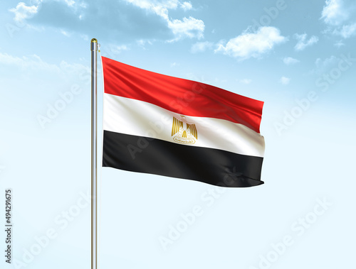 Egypt national flag waving in blue sky with clouds. Egypt flag. 3D illustration Free Download Egypt national flag waving in blue sky with clouds. Egypt flag. 3D illustration - GFXLoad