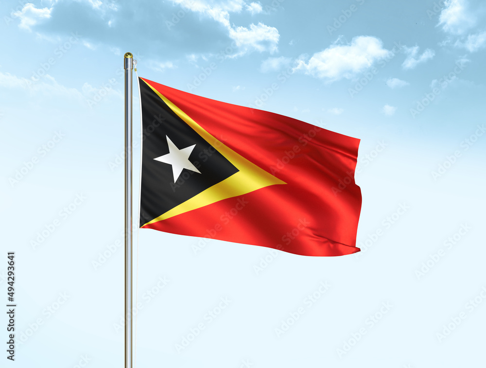 Timor-Leste national flag waving in blue sky with clouds. Timor-Leste flag. 3D illustration Timor-Leste national flag waving in blue sky with clouds. Timor-Leste flag. 3D illustration