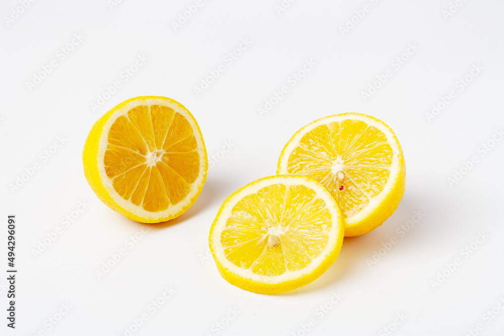 lemon slices lie on a white background, copy space lemon slices lie on a white background, copy space