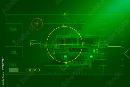night vision air to ground target sighting on armed military vehicle photo