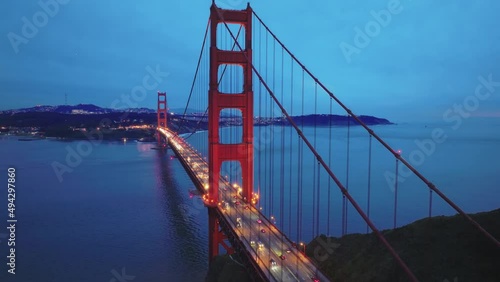 San Francisco landmark at sunset on cloudy day, aerial view Golden Gate Bridge 