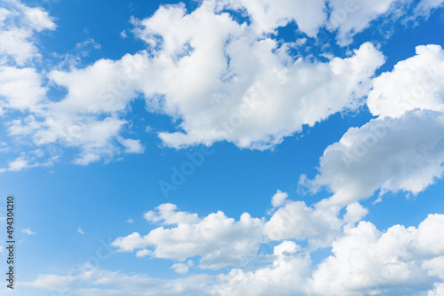 Clouds and blue sky. Cirrus and cumulus clouds on blue sky background.