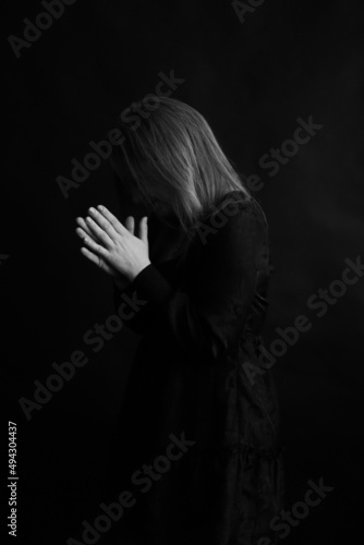 beautiful female hands close-up, art portrait of black and white palms, fuzzy and blurred film photography