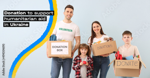 Volunteers with donation bo...