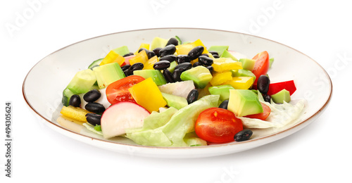 Plate of Mexican vegetable salad with black beans and radish on white background