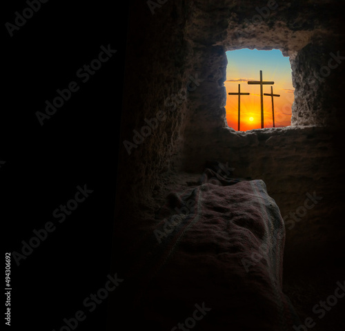 Fotografiet Easter morning, Golgotha hill with silhouettes of the cross,