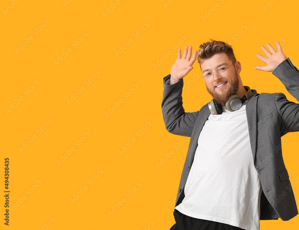 Cool dancing young man on color background Cool dancing young man on color background