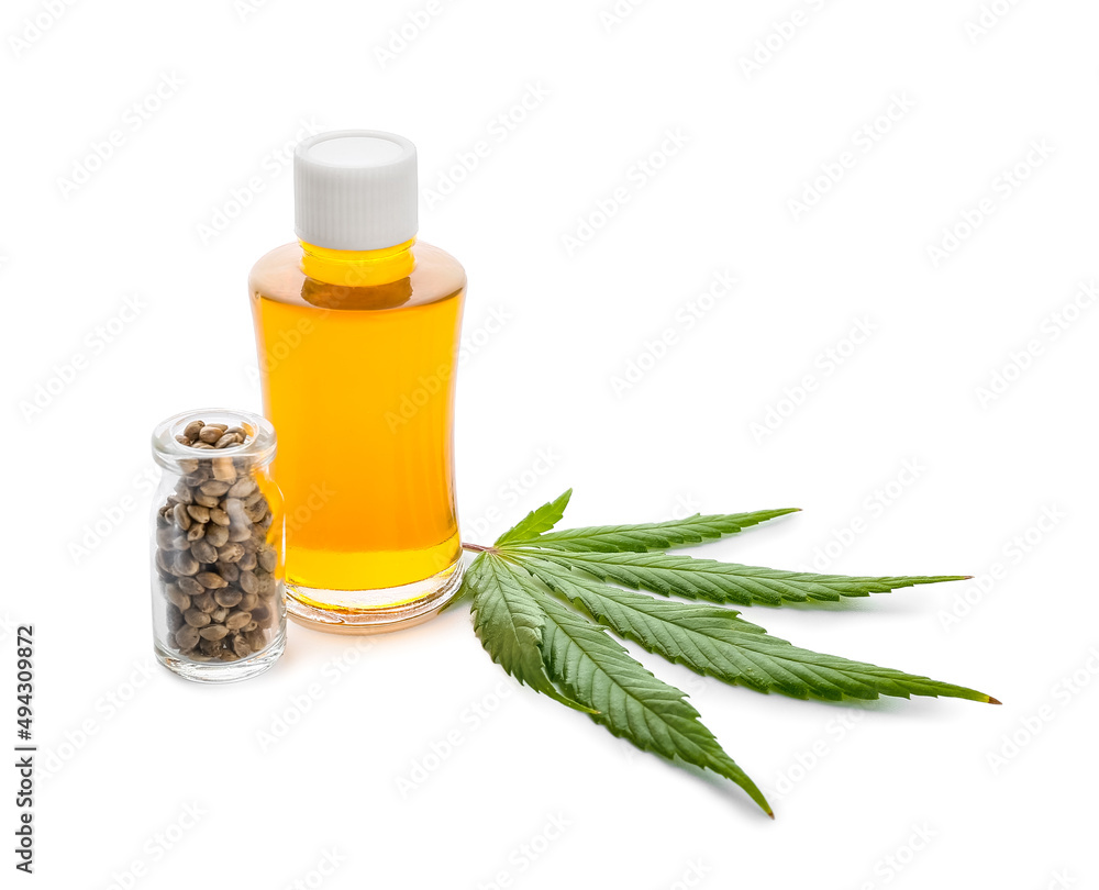 Bottle of CBD oil on white background Bottle of CBD oil on white background
