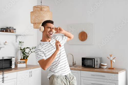 Young man with headphones s...