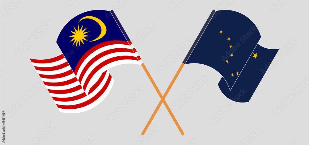 Crossed and waving flags of Malaysia and the State of Alaska Crossed and waving flags of Malaysia and the State of Alaska
