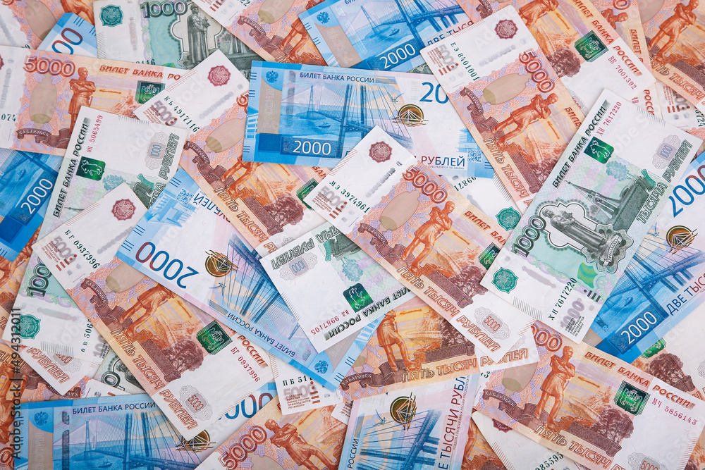 Background of Russian banknotes in denominations of 1000,2000 and 5000 rubles Background of Russian banknotes in denominations of 1000,2000 and 5000 rubles