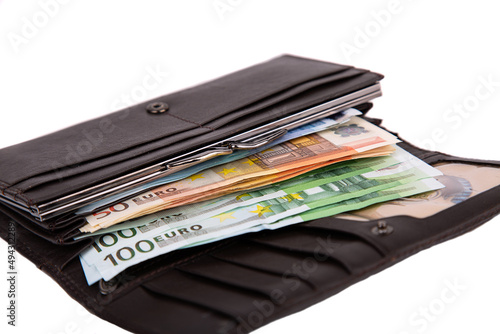 Wallpaper Mural An open wallet full of money in denominations of 50 and 100 euros isolated on a white background close-up Torontodigital.ca