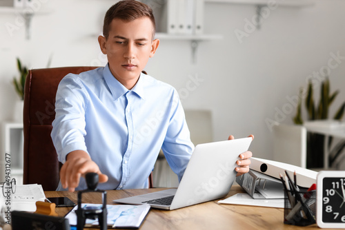 Young male notary public wo...