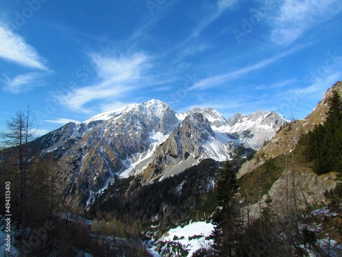 Winter view of mountains Stol in Karavanke mountains in Gorenjska region of Slovenia covered in snow on a clear sunny day