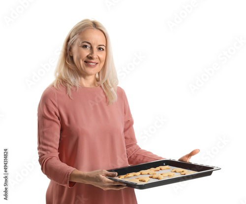 Mature woman holding baking...