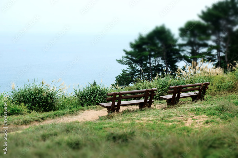 The Hill of Wind is a famous tourist destination in Korea with pretty windmills. The Hill of Wind is a famous tourist destination in Korea with pretty windmills.