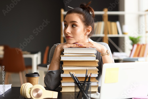 Beautiful female student wi...