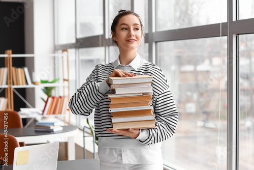 Beautiful female student wi...