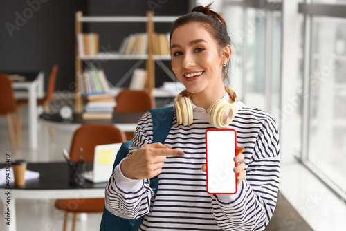 Beautiful female student wi...