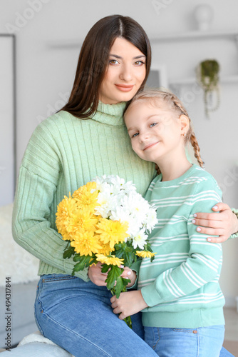 Young mother and her little...