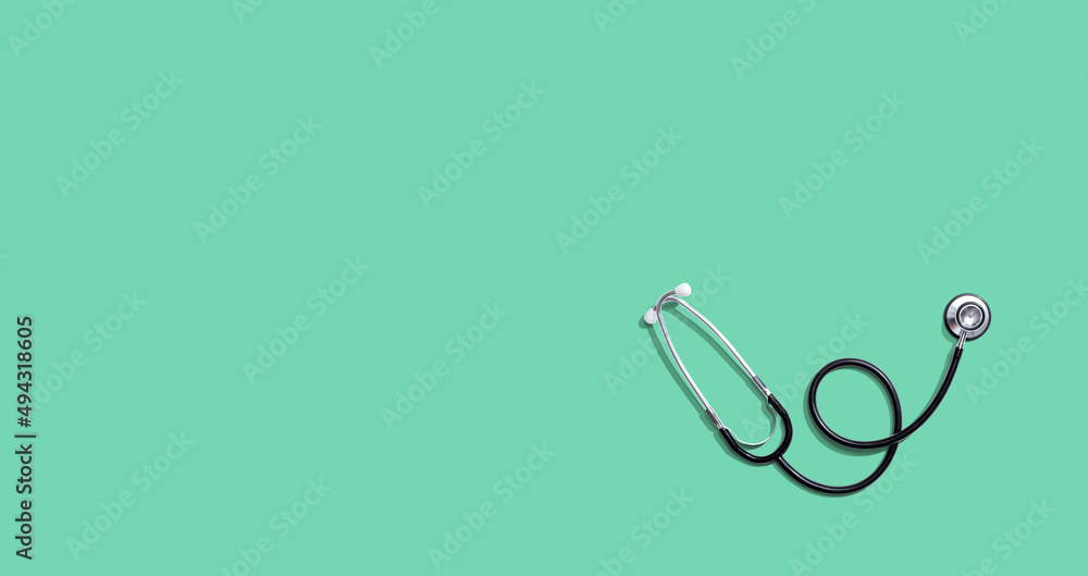 Stethoscope - healthcare and medicine theme - flat lay Stethoscope - healthcare and medicine theme - flat lay