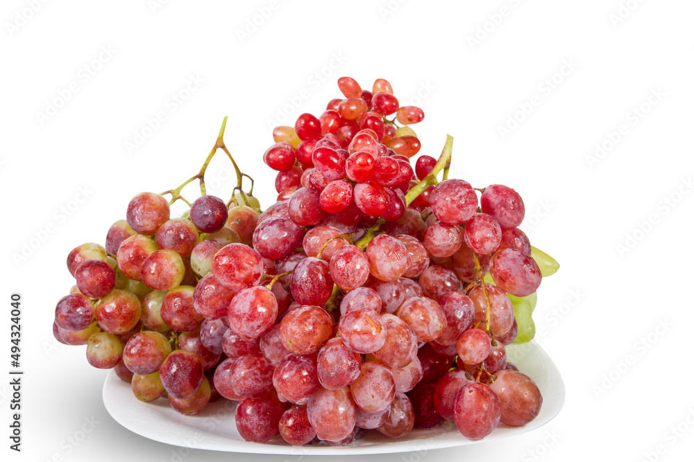 Plate of fresh red grapes isplated on white Plate of fresh red grapes isplated on white