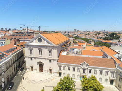 Sao Roque Church and the Lisbon townscape on a sunny day, Portugal photo