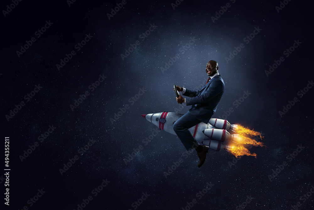 Businessman on a rocket . Mixed media