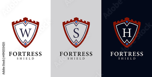 shield fortress logo. illustration of a shield with a fortress and letters in the middle