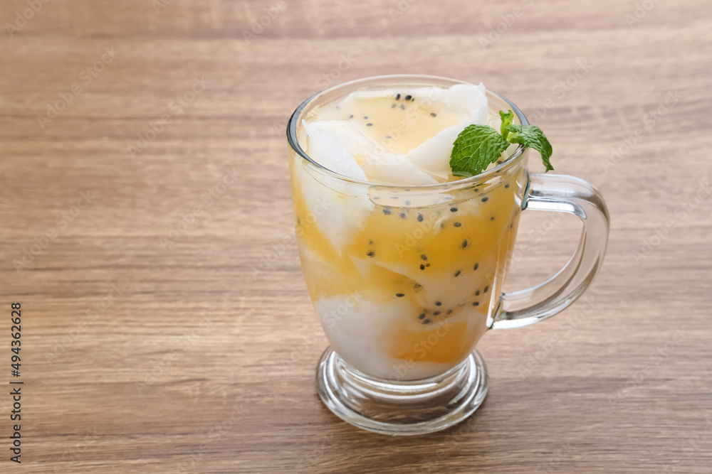 Es Kelapa Jeruk, a typical Indonesian drink made from fresh oranges squeezed with grated young coconut.
Es Kelapa Jeruk, a typical Indonesian drink made from fresh oranges squeezed with grated young coconut.