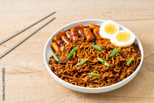 Jjajang Rabokki - Korean instant noodles or Ramyeon with Korean rice cake or Tteokbokki and egg in black bean sauce