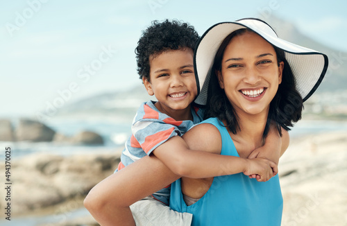 I love spending time with my son. Shot of a mother and son bonding while on vacation at the beach. © N Felix/peopleimages.com