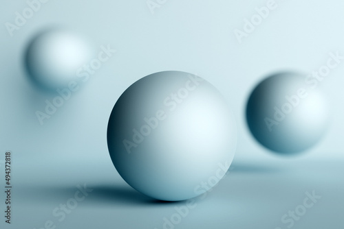 3D rendering. White inflatable balls. Close-up of geometric figure balls flying