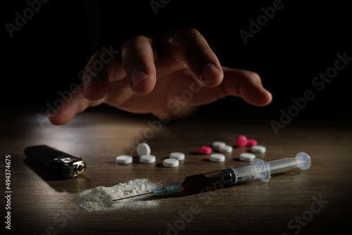 Quadro su tela Stop drug addiction concept International Day against Drug syringe and cooked heroin on spoon
