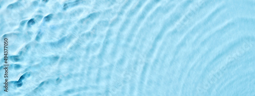 Cosmetic moisturizer micellar water. Abstract transparent liquid wavy banner. Soft focus