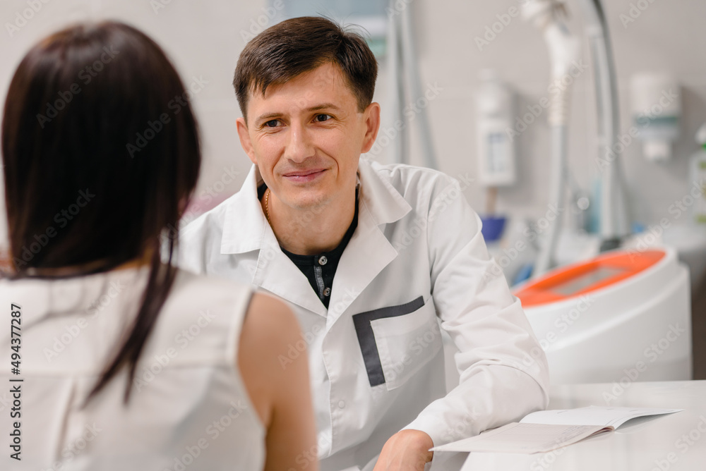 Female client talking about her skin problems with qualified beautician Female client talking about her skin problems with qualified beautician