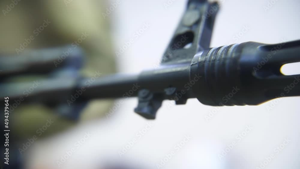 The barrel of the weapon is close-up. Military assault rifle. The barrel of the weapon is close-up. Military assault rifle.