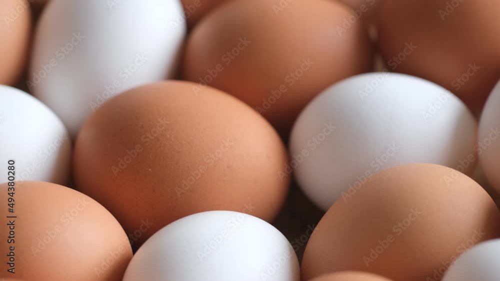 Chicken egg, rotation shot, Chicken fresh raw eggs.Healthy fresh food ingredients for breakfast. Animal products. Grocery. Chicken farm fresh eggs Chicken egg, rotation shot, Chicken fresh raw eggs.Healthy fresh food ingredients for breakfast. Animal products. Grocery. Chicken farm fresh eggs