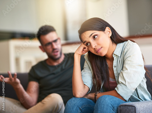 I wish we would stop arguing for once. Shot of a young woman looking unhappy after having a fight with her partner at home.