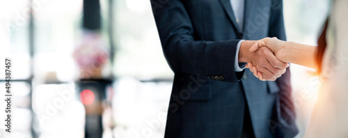Фотография Business people shaking hands, finishing up meeting, business etiquette, congratulation, merger and acquisition concept